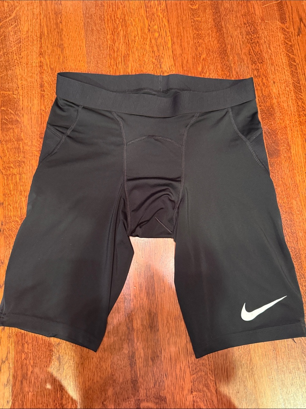 Nike Black Men’s Athletic Compression Shorts with White Swoosh